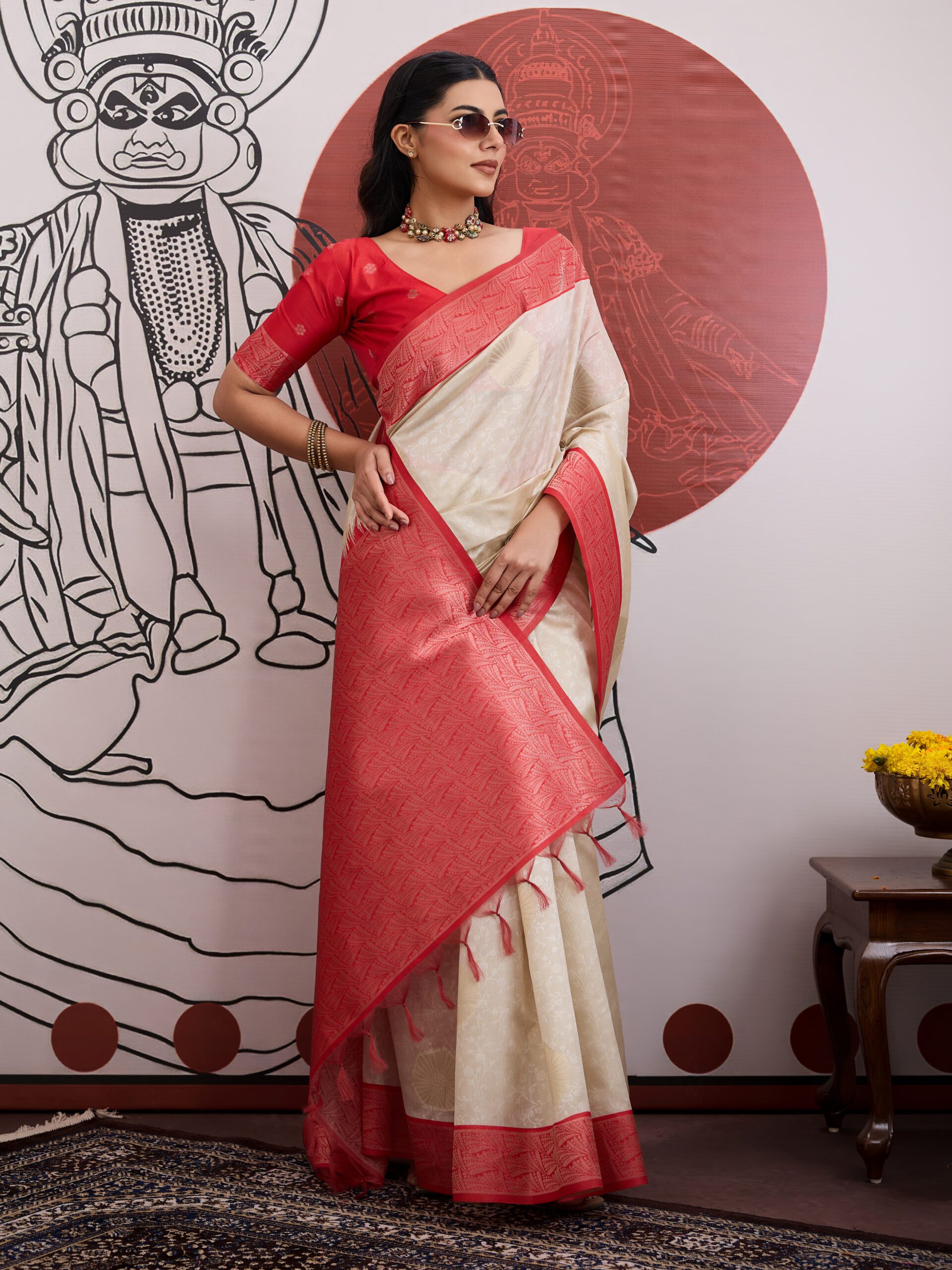 Elegant ivory red woven saree with rich red border and traditional design