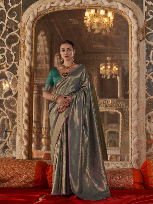 Rajwada teal antique brocade silk saree with rich gold zari weaving and traditional royal design