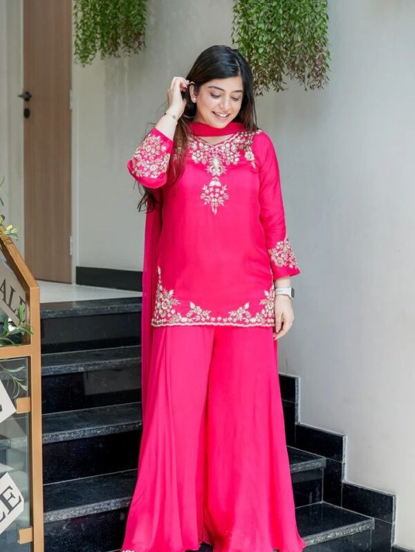"Rani Pink embroidered kurta palazzo set with matching dupatta for festive wear."