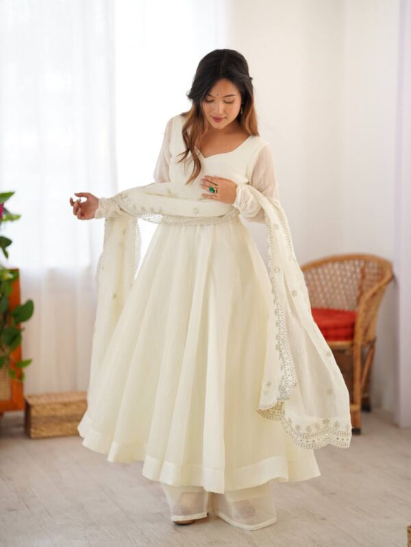 "Elegant Ivory Organza Anarkali suit with embroidered scalloped dupatta and sheer sleeves – Chandni Grace Collection."